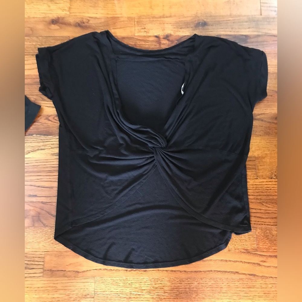 Ladies Girls Athletic Dri-fit Activewear Tops
Black open back twisted knots - Picture 15 of 16